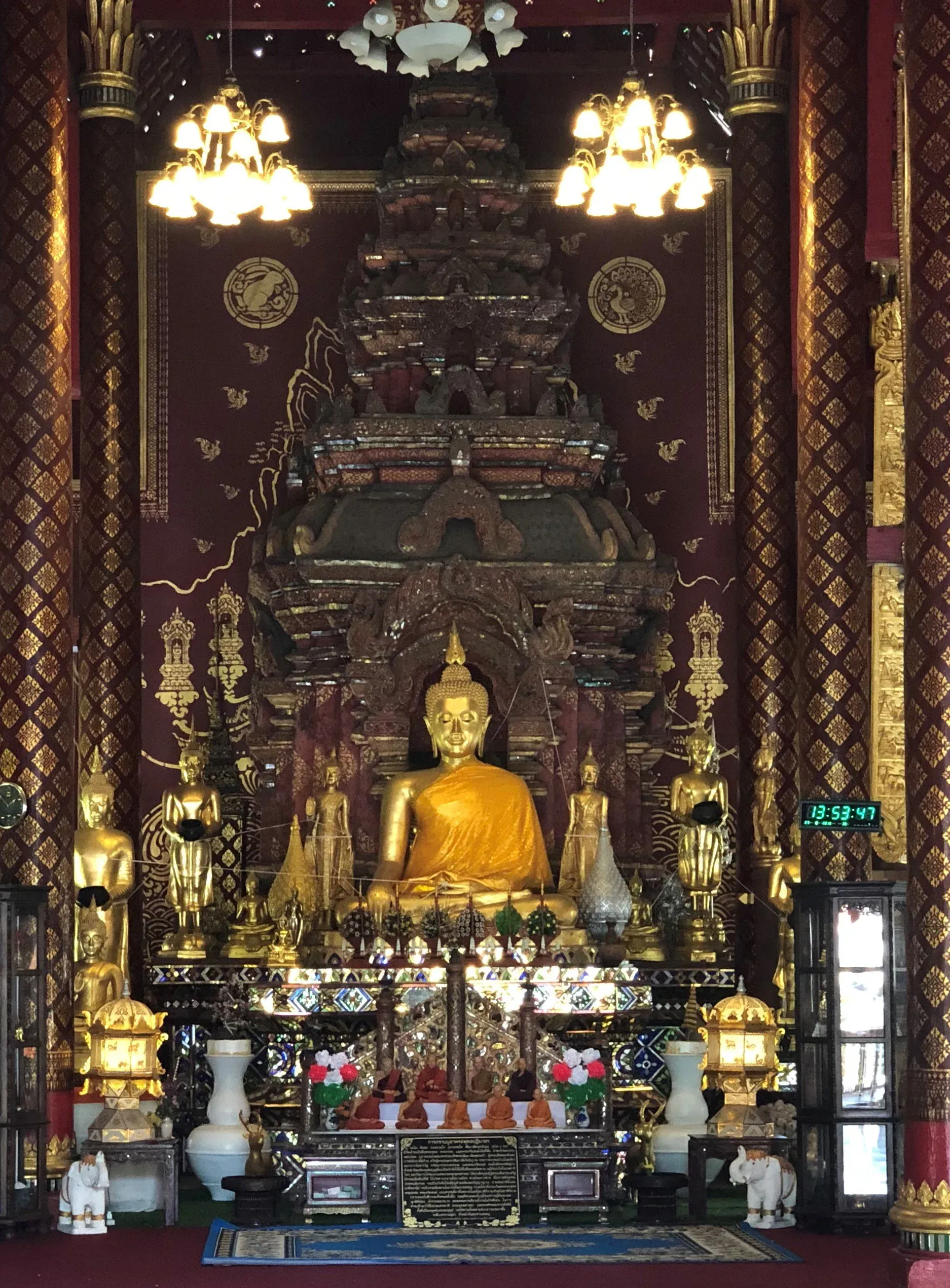 Golden Buddha statues in a temple.