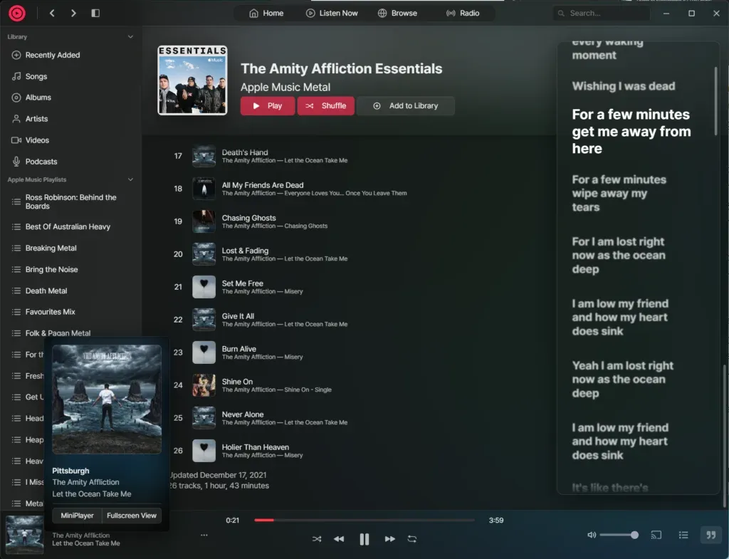 The Amity Affliction Essentials playlist with lyrics beside it and a popup offering MiniPlayer or Fullscreen View