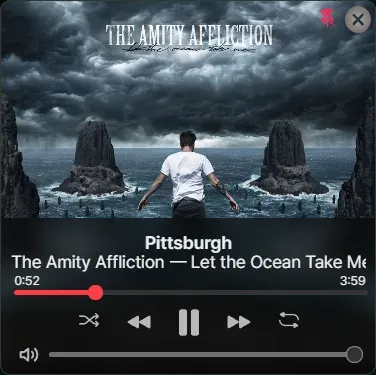 Cider's small floating mini player with album art, Pittsburgh by The Amity Affliction, and transport controls
