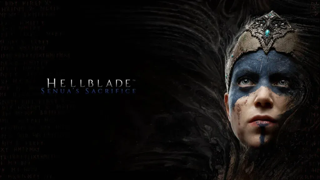 Senua's face half-lit, blue warpaint across her eyes, runes carved down the dark left side