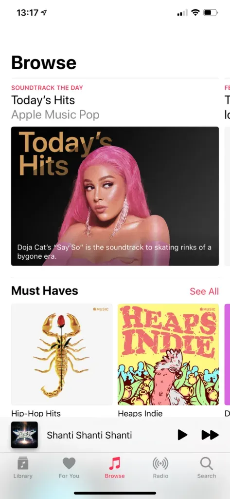 iPhone Browse tab led by a Today's Hits pop feature and a Must Haves playlist row